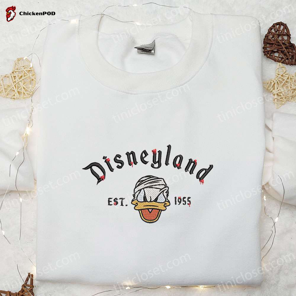 Vintage Donald Disneyland Halloween 1955 Embroidered Sweatshirt & Hoodie: Unique Disney Halloween Shirt Ideas