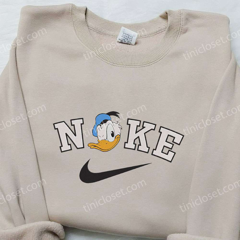 Donald Duck x Nike Embroidered Hoodie & Shirt: Disney Inspired Apparel with Nike Style