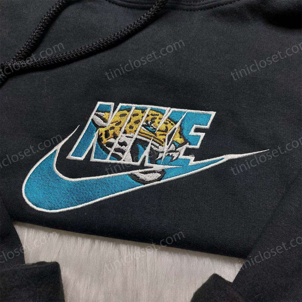 Nike x Jacksonville Jaguars Embroidered Shirt: NFL Fan Gear for Sports Enthusiasts